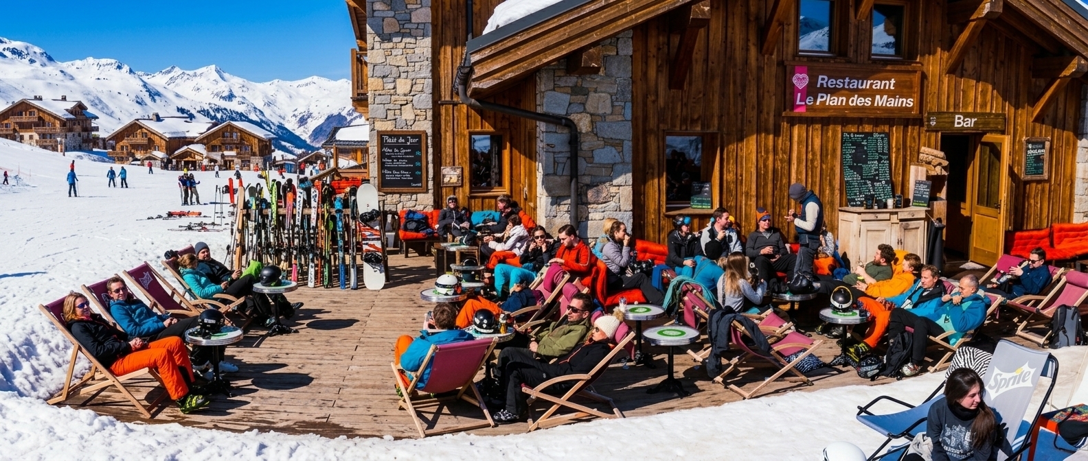 Solterrasse ved en fjellrestaurant midt i skianlegget